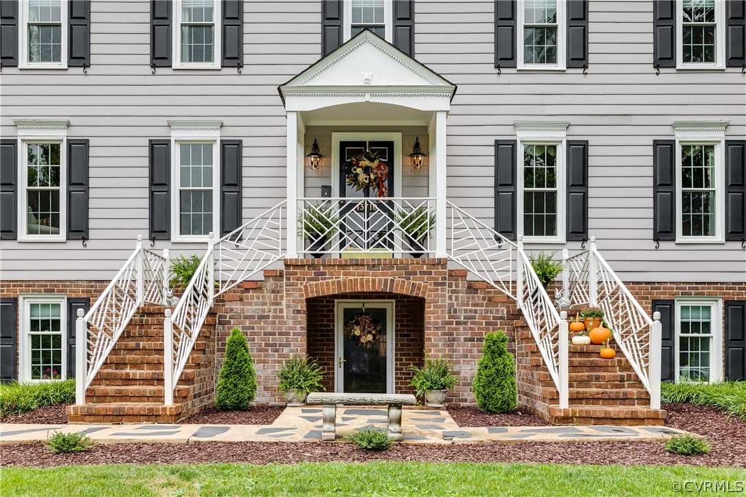 13710 Thorngate Road Midlothian, VA 23113 - Photo 3 of 48 a front view of a house with a yard and potted plants