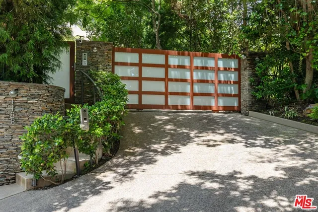 a view of a street with a building in the background