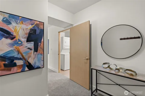 a bathroom with a sink mirror and vanity