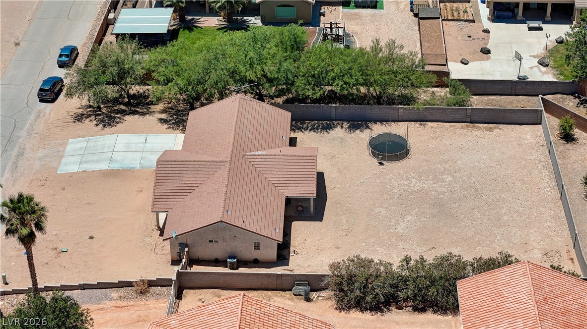 1272 Liston Avenue Logandale, NV 89021 - Photo 51 of 61 Aerial view showcasing the property's generous land and sturdy tile roof.