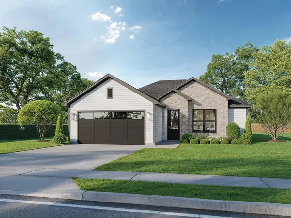 a view of a house with a yard and large trees