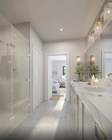 a spacious bathroom with a granite countertop sink a mirror and a shower