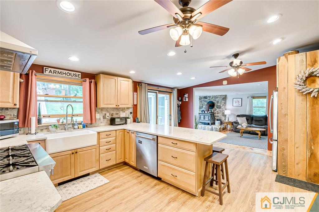100 Mitchell Road Port Murray, NJ 07865 - Photo 2 of 48 a large white kitchen with a large window