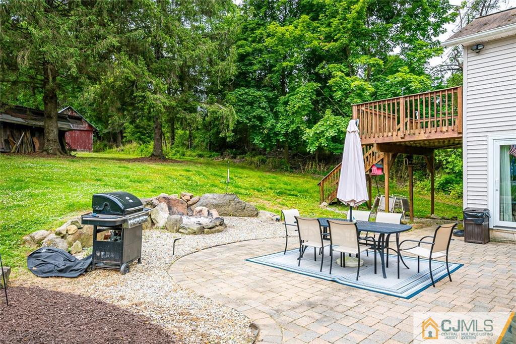 100 Mitchell Road Port Murray, NJ 07865 - Photo 8 of 48 a view of a patio with a table and chairs