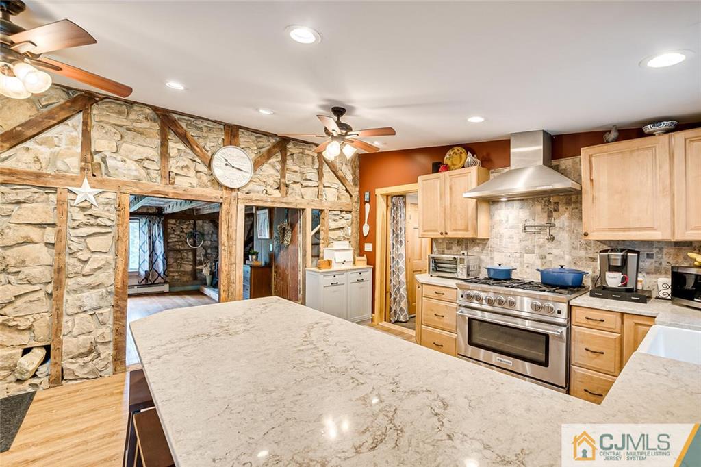 100 Mitchell Road Port Murray, NJ 07865 - Photo 9 of 48 a kitchen with stainless steel appliances granite countertop a stove and cabinets