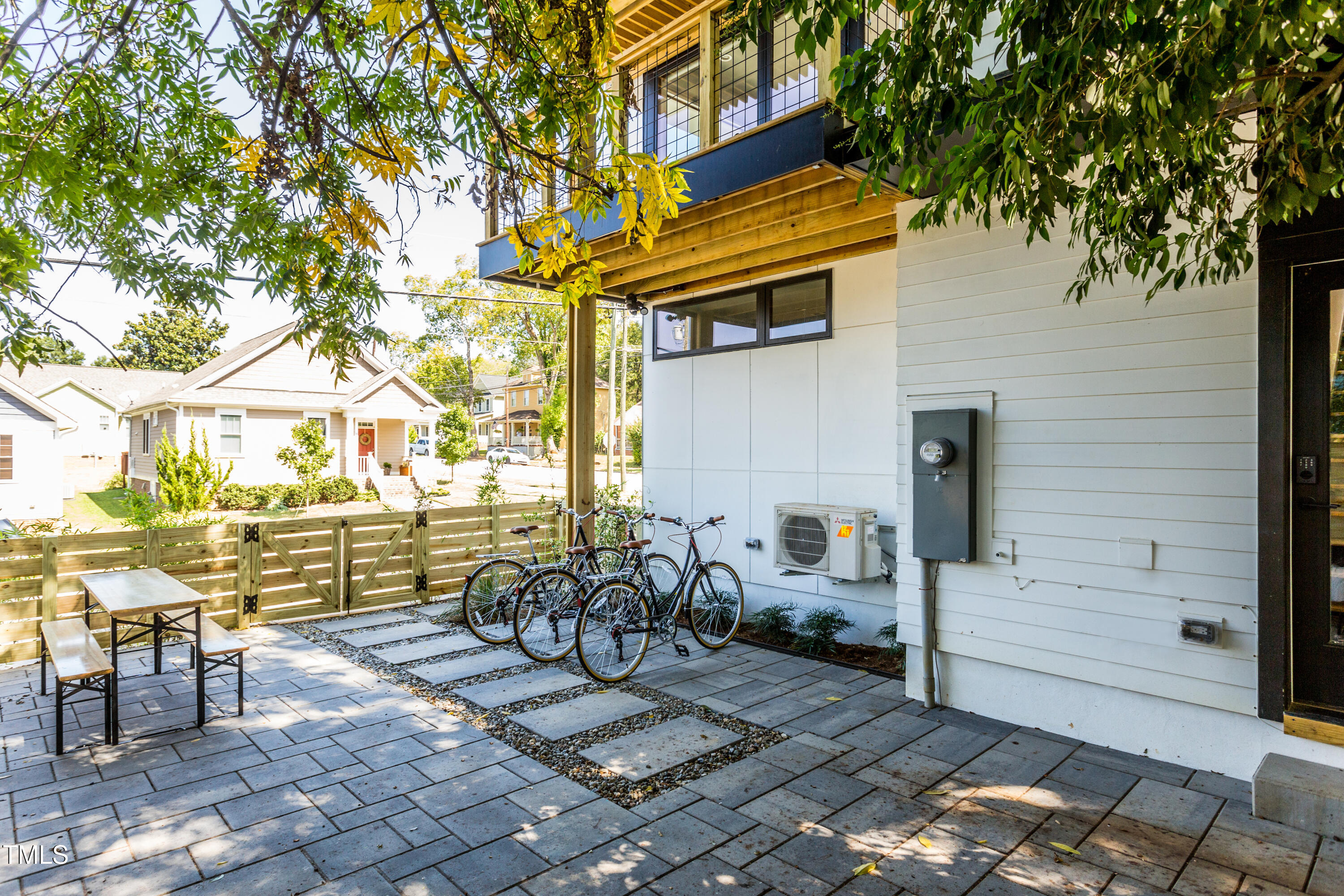 123 Idlewild Avenue, Unit 101 Raleigh, NC 27601 - Photo 8 of 27 a view of a chairs and table in the patio