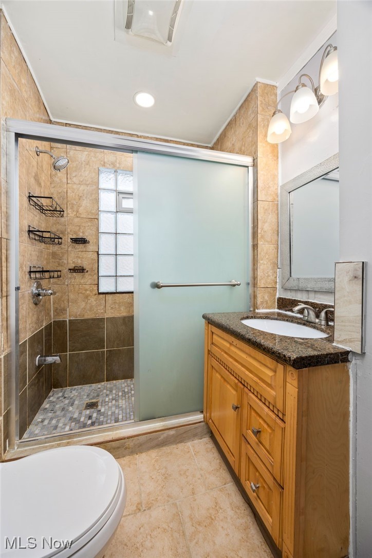 3368 Berea Road Cleveland, OH 44111 - Photo 18 of 26 Full bathroom featuring vanity, a stall shower, crown molding, and recessed lighting