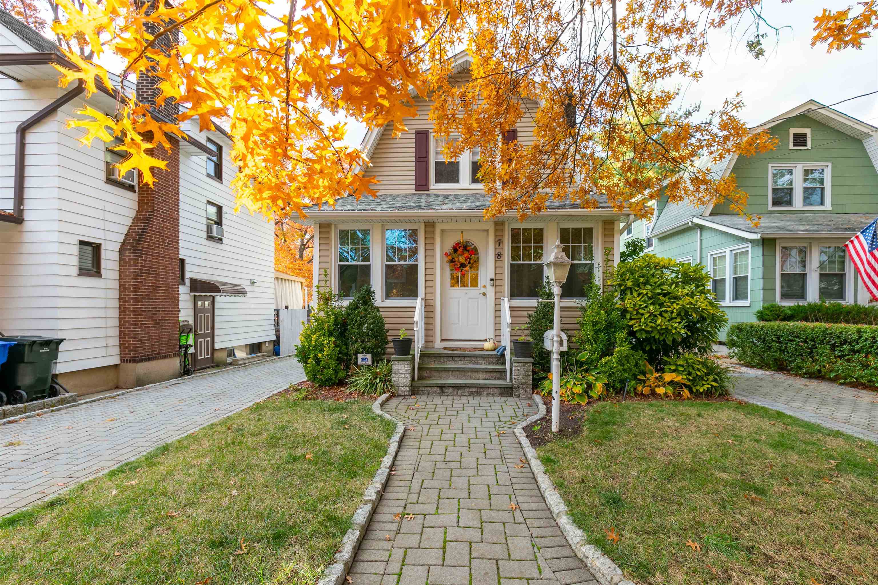 front view of a house with a yard