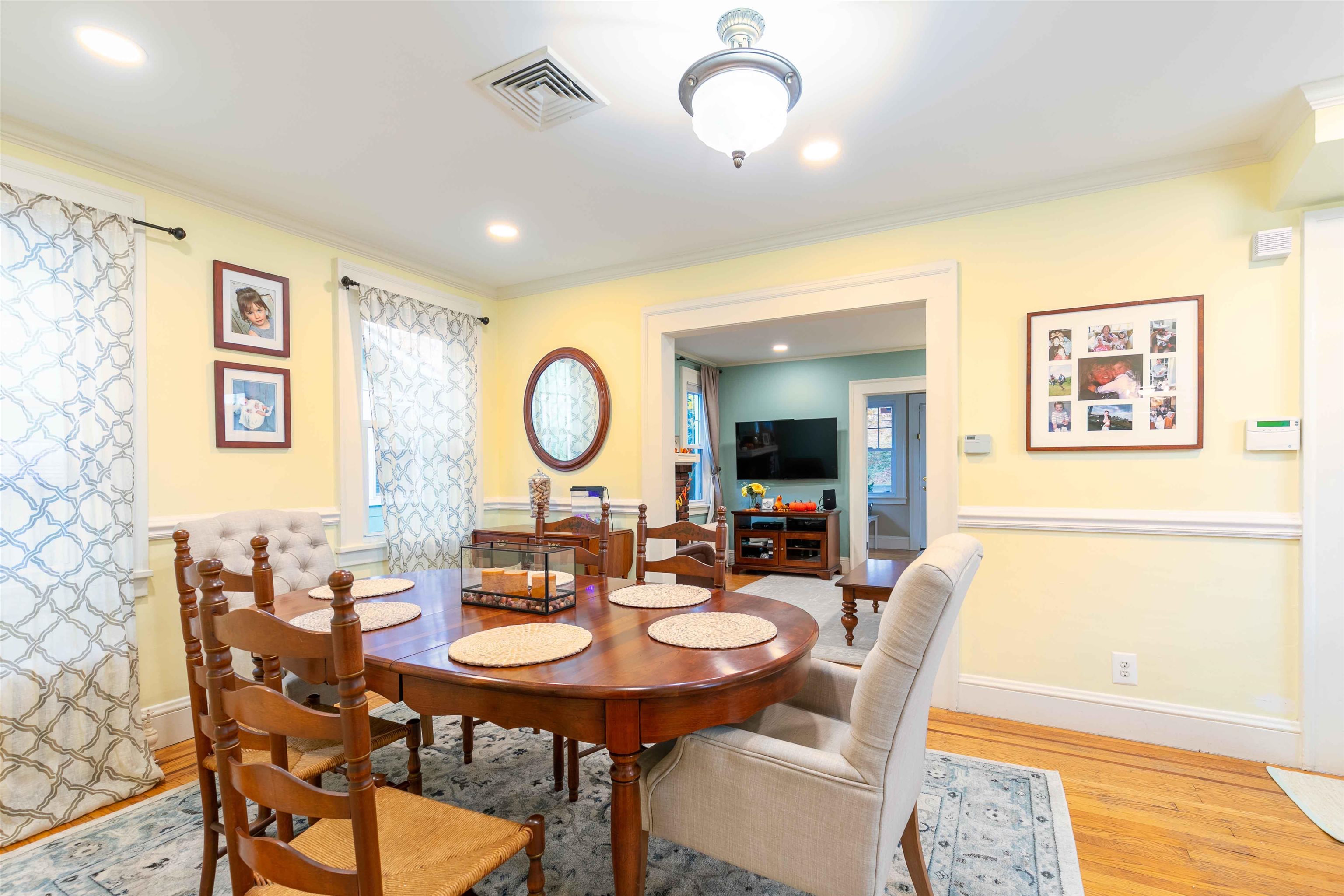 78 Jackson Avenue Rutherford, NJ 07070 - Photo 11 of 36 a view of a dining room with furniture and wooden floor