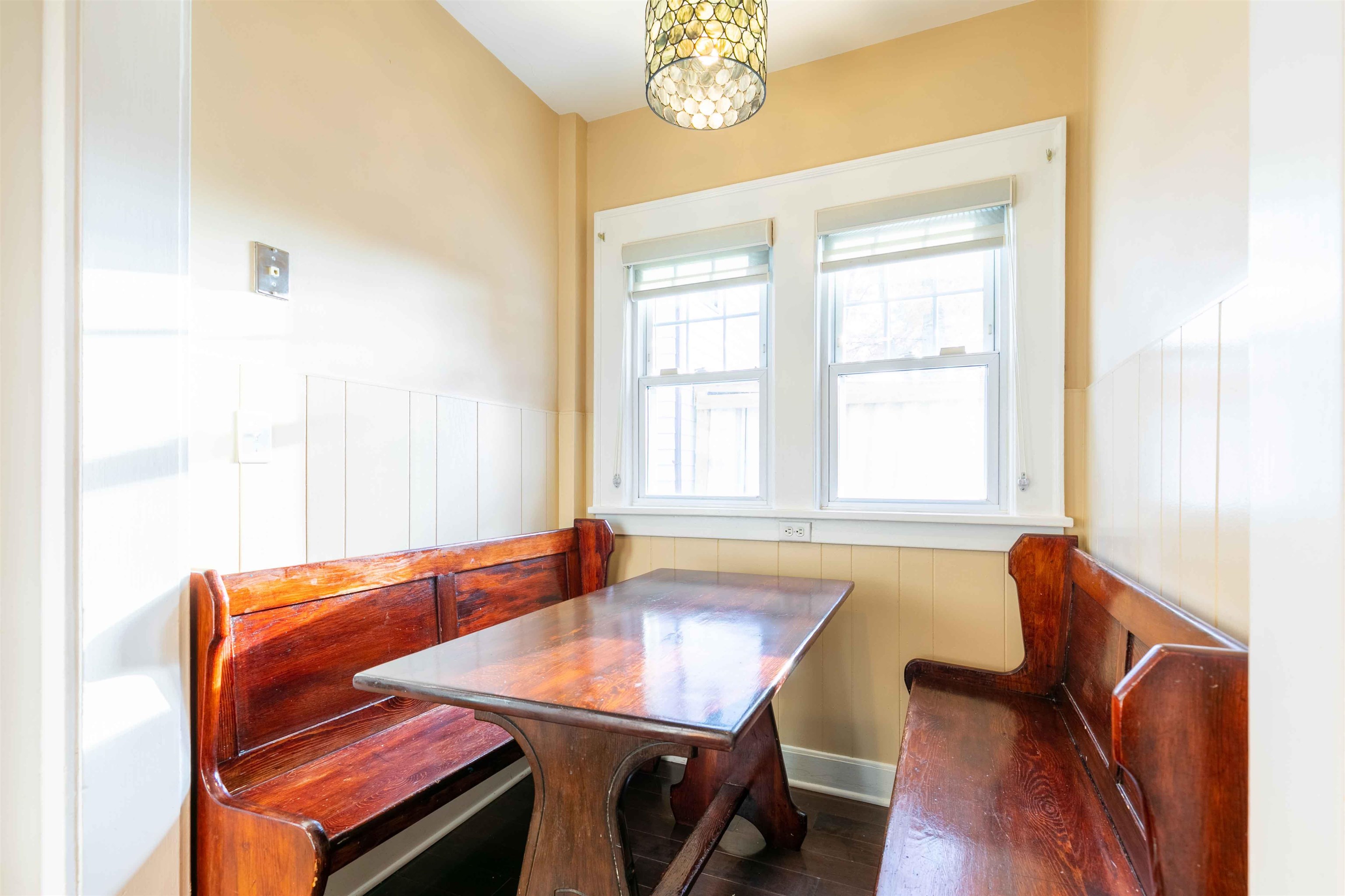 78 Jackson Avenue Rutherford, NJ 07070 - Photo 16 of 36 a view of a dining room with furniture and a chandelier