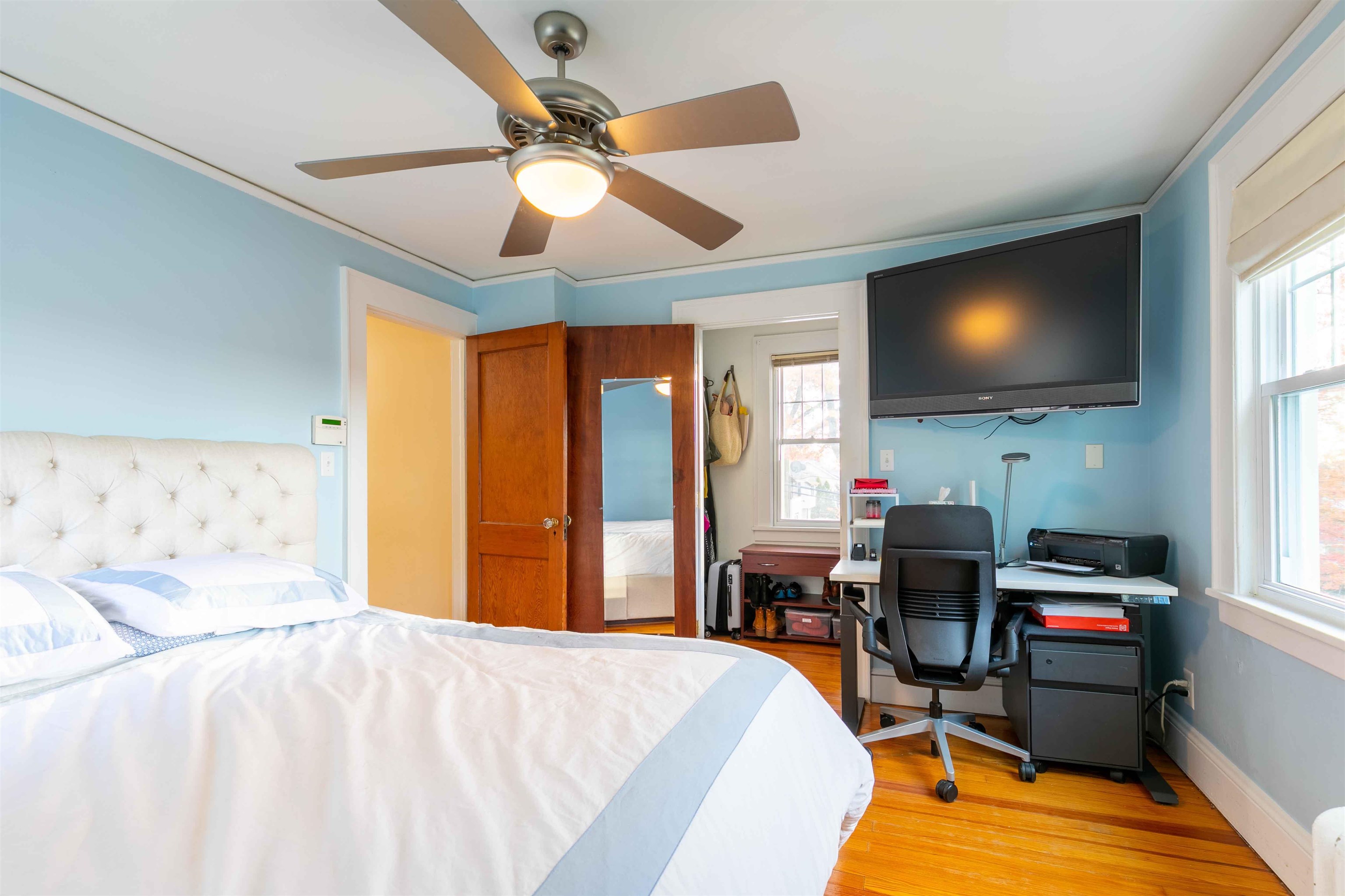 78 Jackson Avenue Rutherford, NJ 07070 - Photo 19 of 36 a bedroom with a bed and a flat screen tv