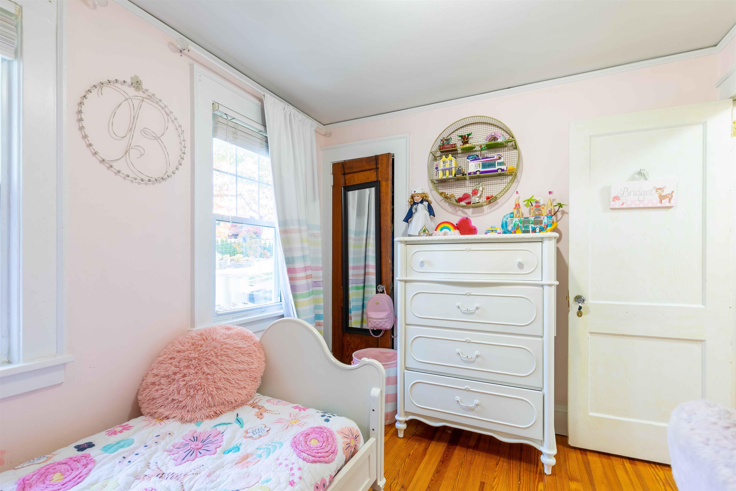 78 Jackson Avenue Rutherford, NJ 07070 - Photo 24 of 36 a bedroom with a bed and a window