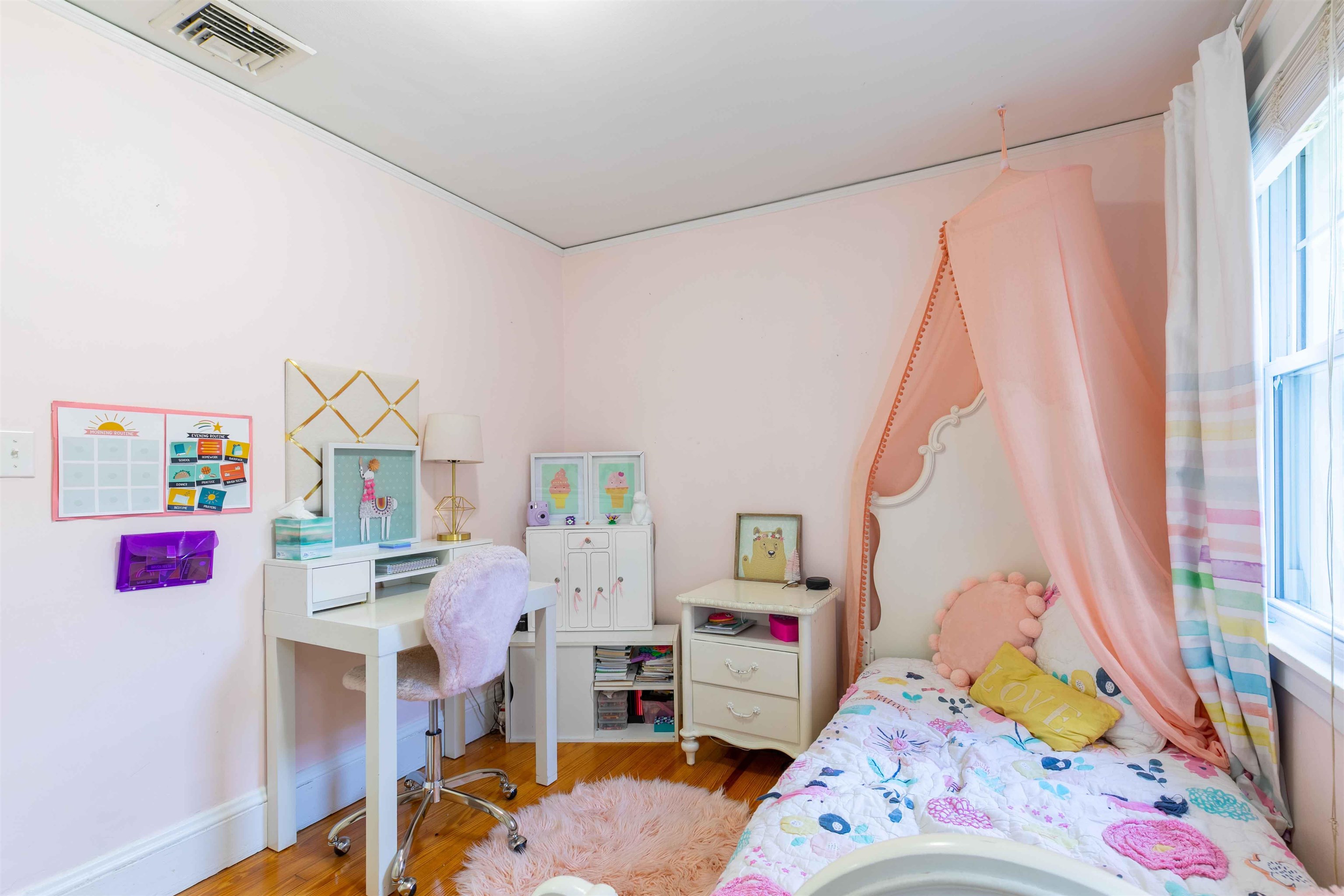 78 Jackson Avenue Rutherford, NJ 07070 - Photo 25 of 36 a bedroom with furniture and a baby crib