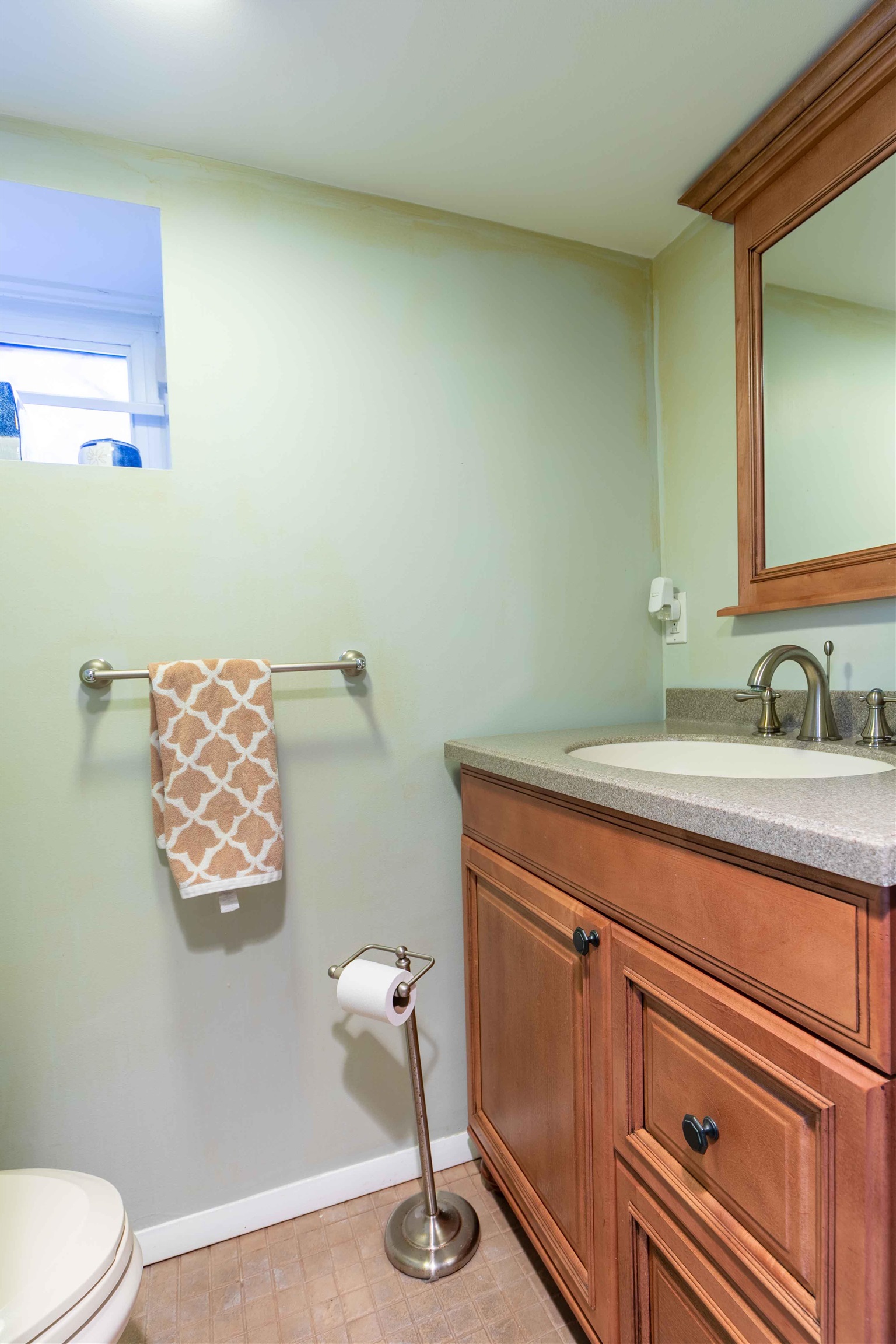 78 Jackson Avenue Rutherford, NJ 07070 - Photo 27 of 36 a bathroom with a sink and a mirror
