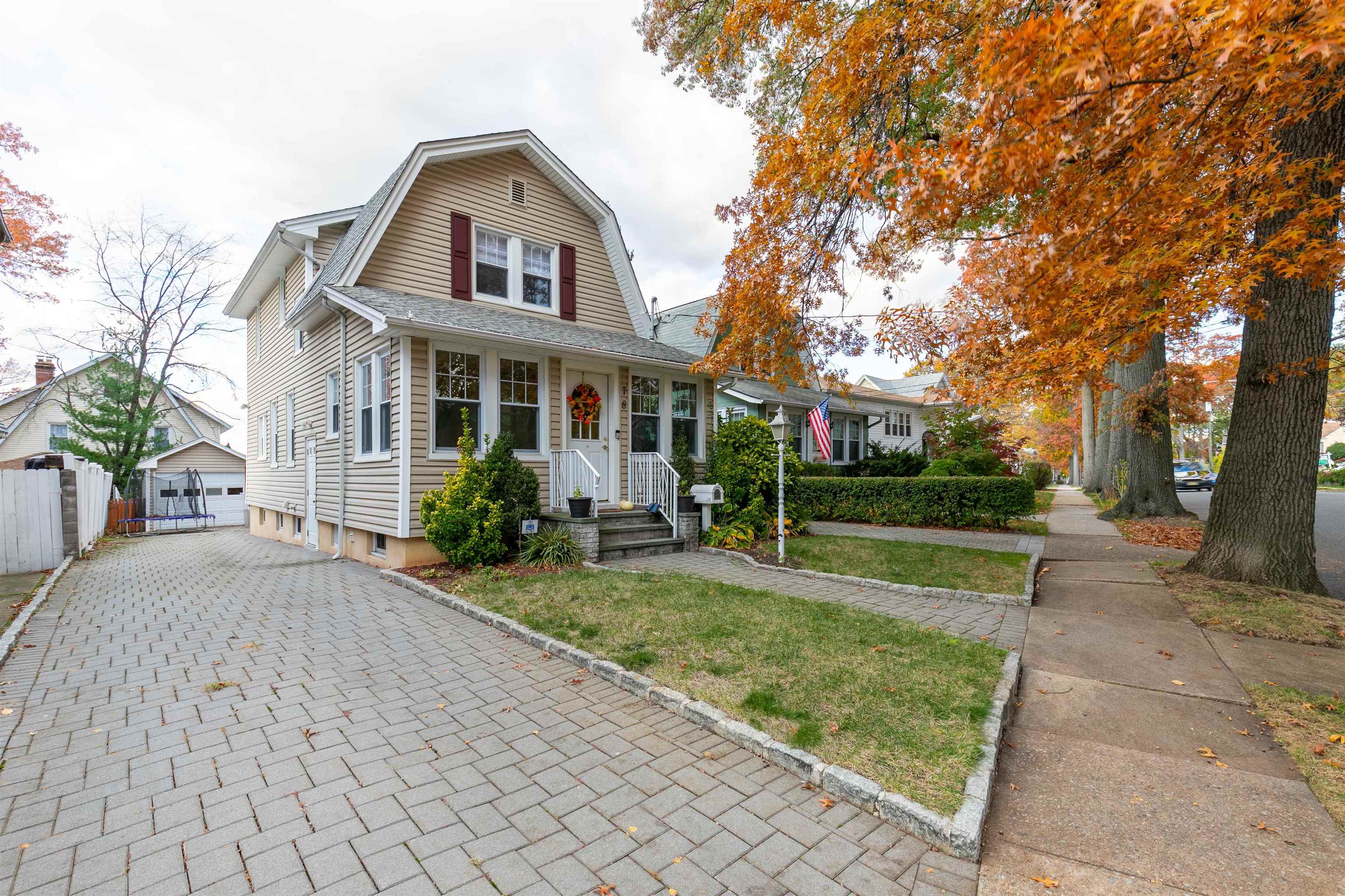 78 Jackson Avenue Rutherford, NJ 07070 - Photo 36 of 36 front view of a house with a yard