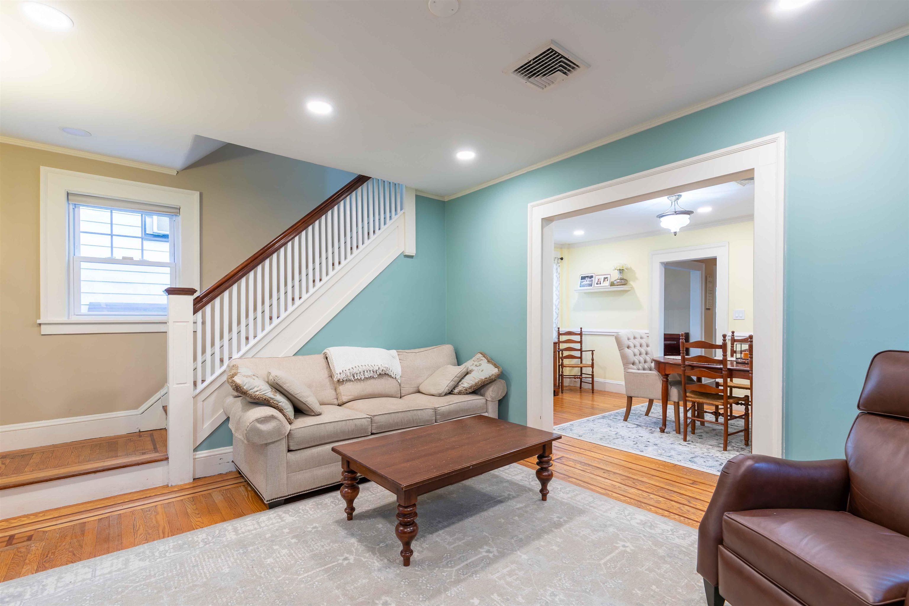 78 Jackson Avenue Rutherford, NJ 07070 - Photo 9 of 36 a living room with furniture and a wooden floor