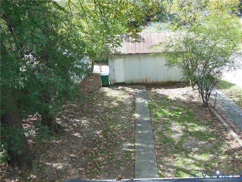 100 East Broad Rock Road Richmond, VA 23224 - Photo 26 of 26 Rear Yard with Detached Garage