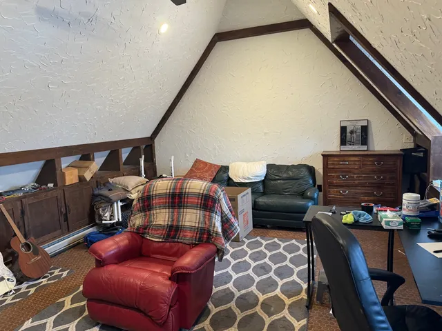 a livingroom with furniture and a couch