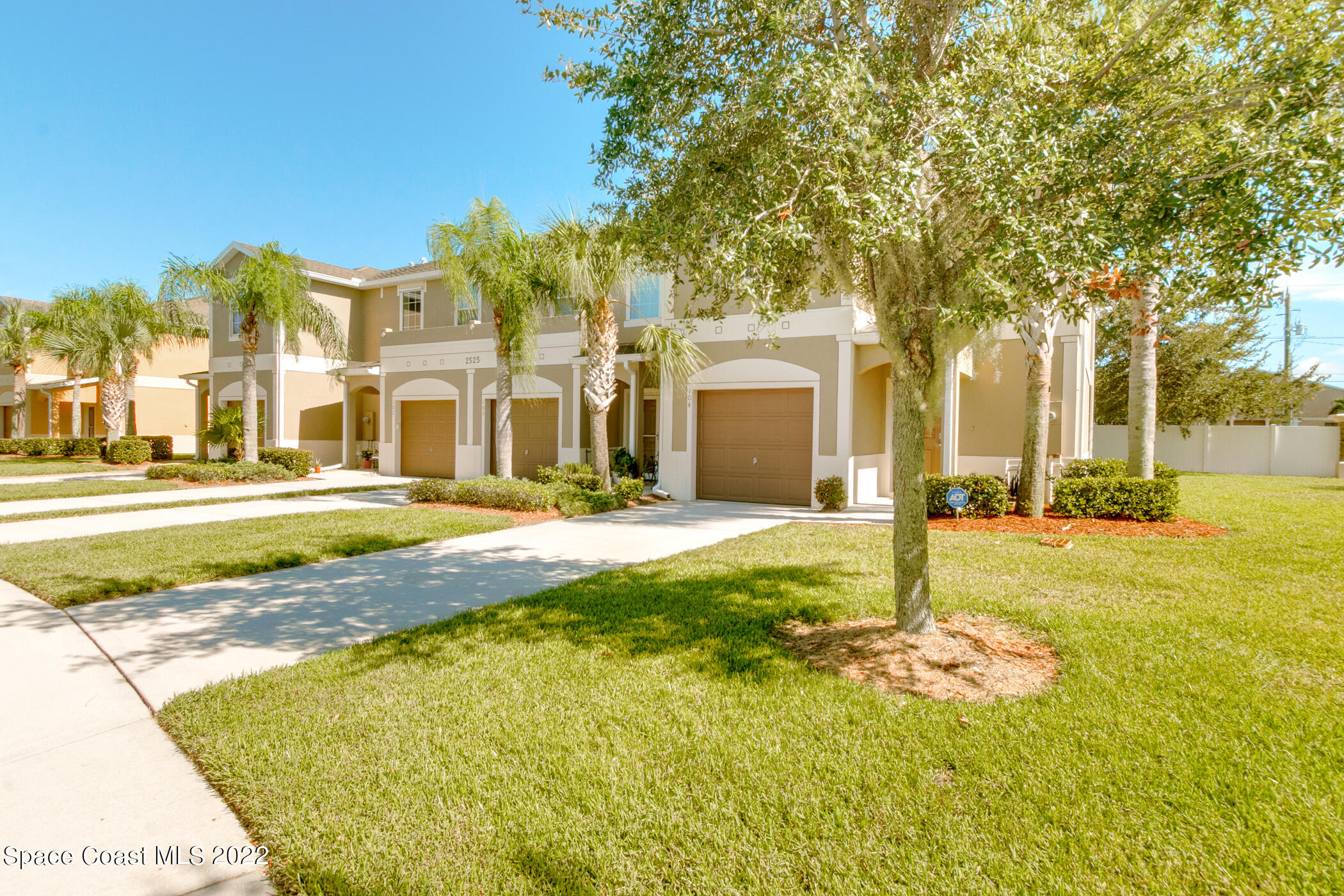 2525 Revolution Street, Unit 104 Melbourne, FL 32935 - Photo 11 of 37 a view of a house with a swimming pool