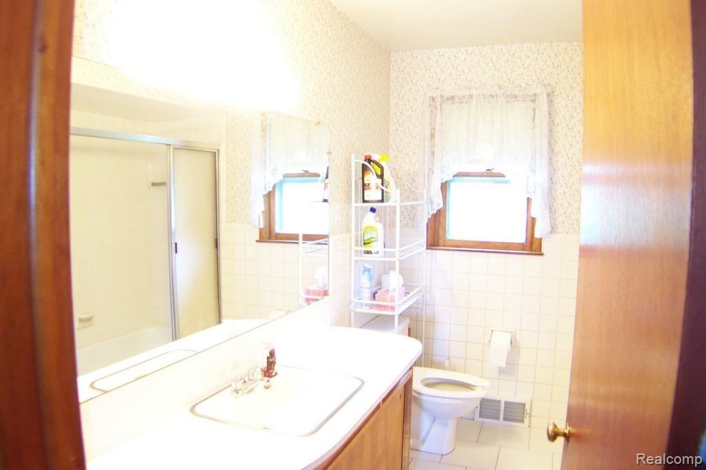 2340 Adams Road Oakland, MI 48363 - Photo 13 of 18 Nice size Bathroom with new ceramic tile