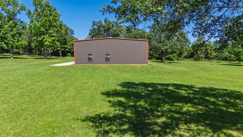 476 Private Road 7326 Emory, TX 75440 - Photo 14 of 33 a view of a house with backyard and a tree