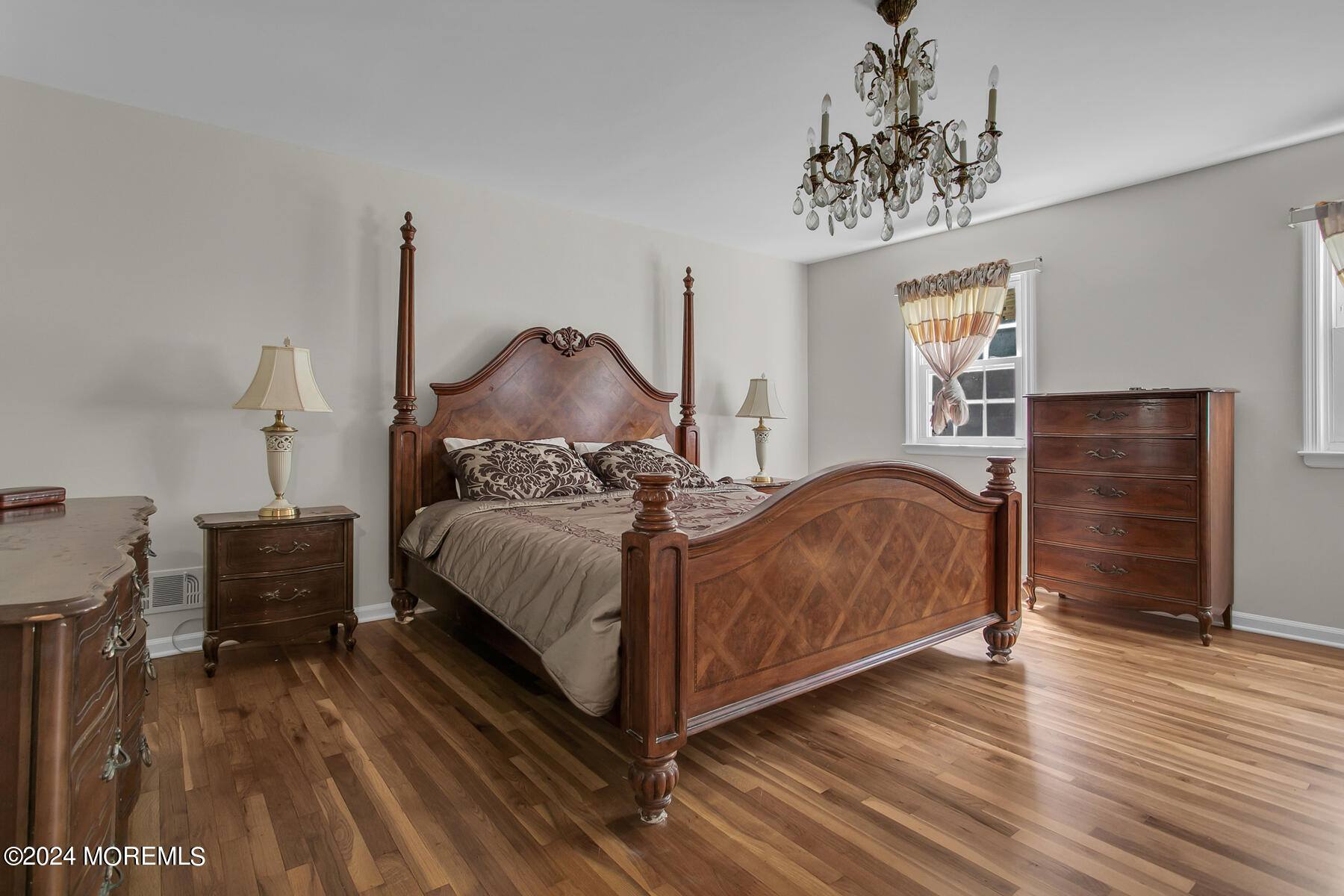 36 Maple Drive Colts Neck, NJ 07722 - Photo 22 of 32 a bedroom with a bed and wooden floor
