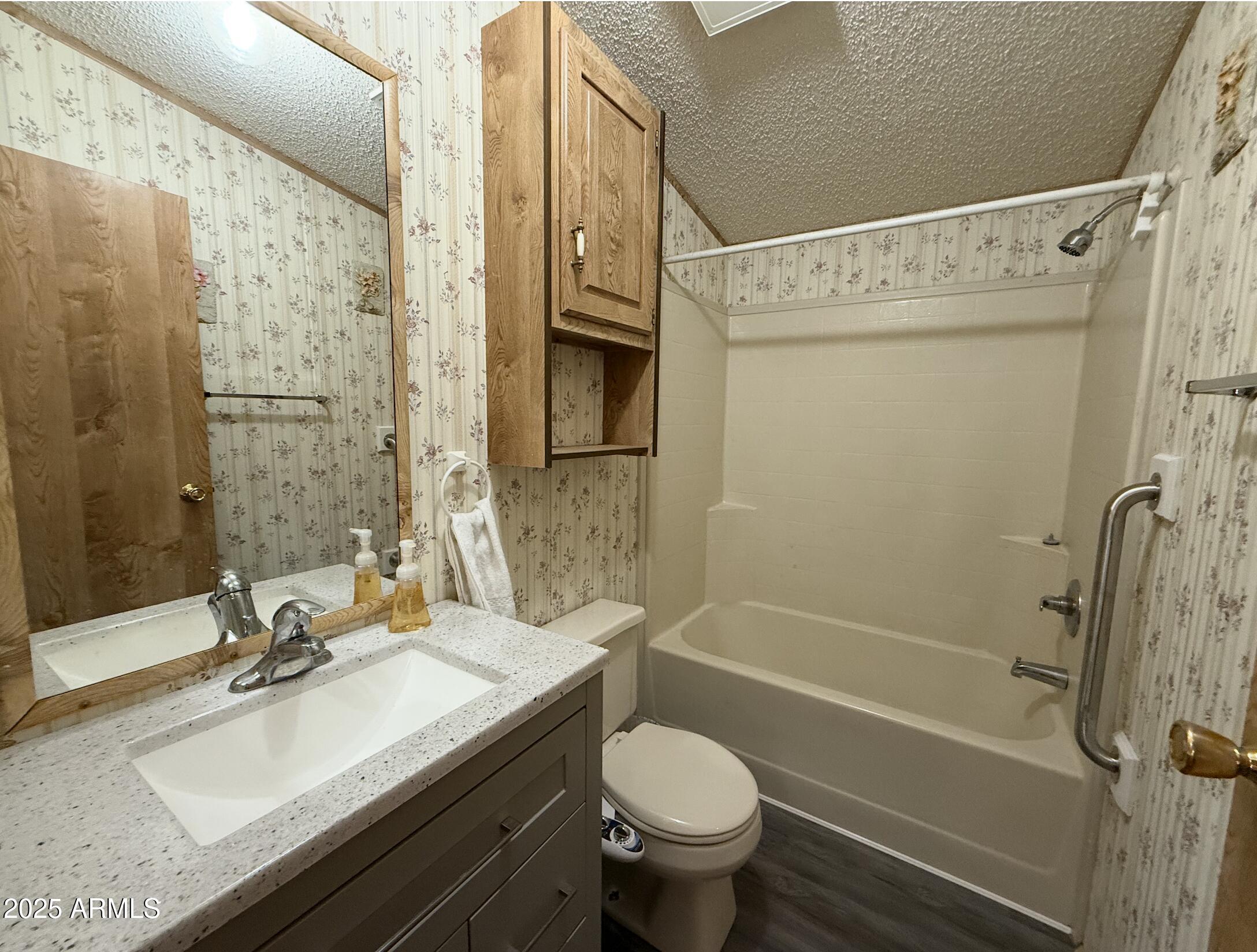 1935 North Tortoise Trail Dragoon, AZ 85609 - Photo 13 of 23 a bathroom with a granite countertop sink toilet and shower