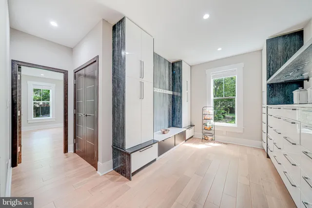 a bedroom with a bed and a desk