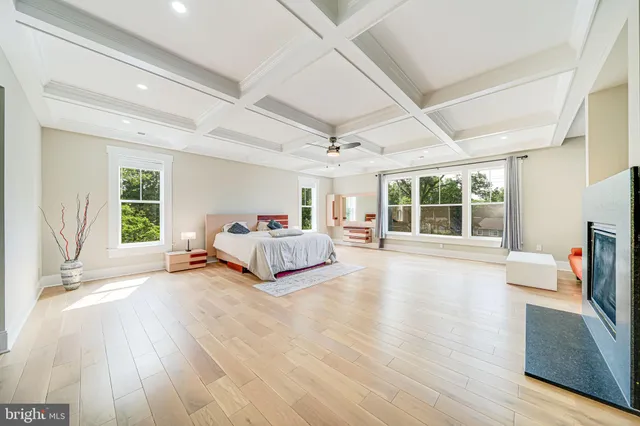 a kitchen with stainless steel appliances kitchen island granite countertop a stove a sink and a refrigerator