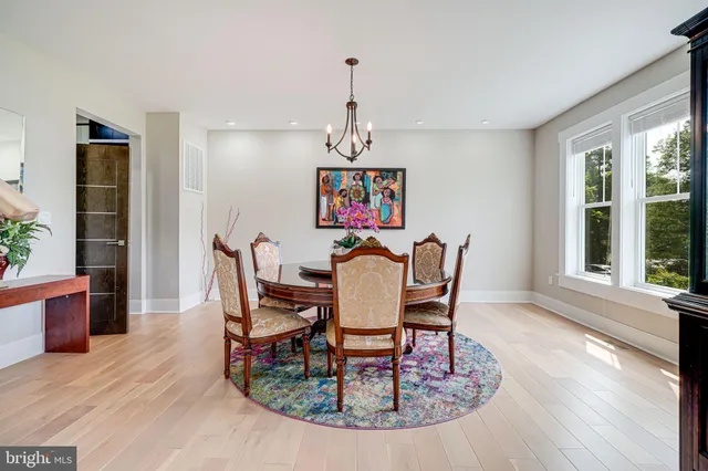 a living room with furniture flat screen tv and a fireplace