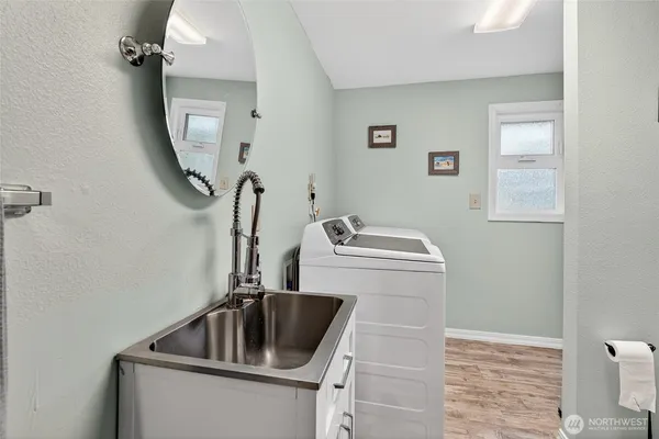a view of a balcony with wooden floor and city view