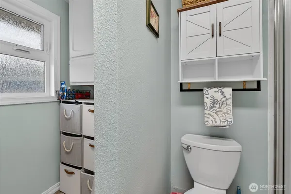 a view of a house with a yard from a balcony