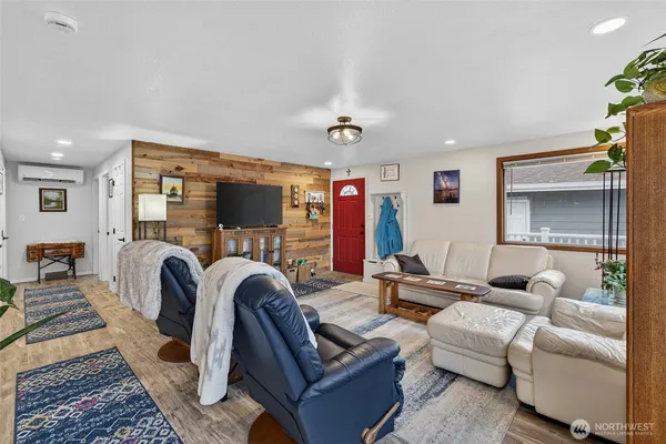a kitchen with stainless steel appliances granite countertop a refrigerator and a counter top space