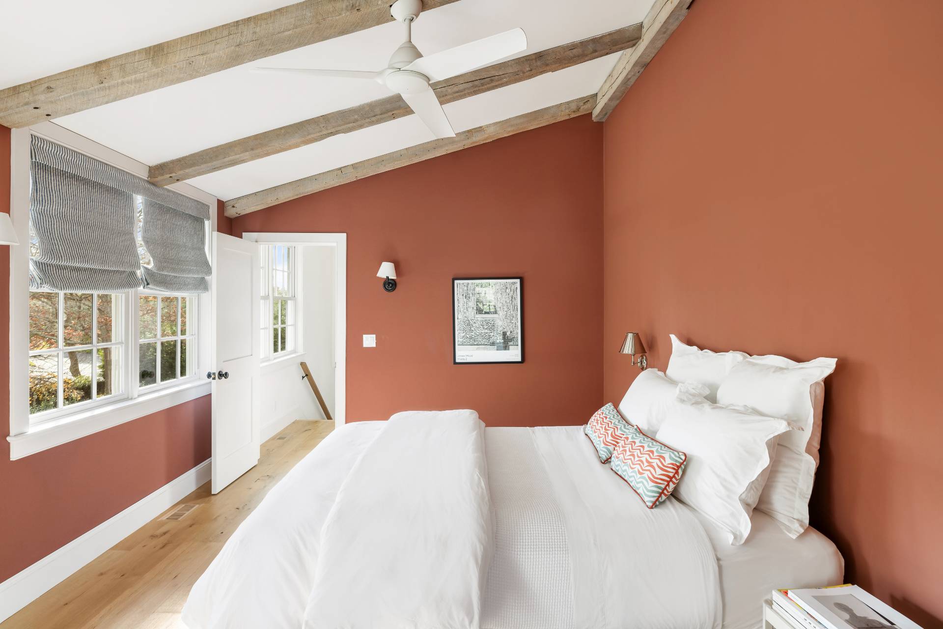 267 Meadows West Bridgehampton, NY 11932 - Photo 17 of 27 a bedroom with a large bed and a large window