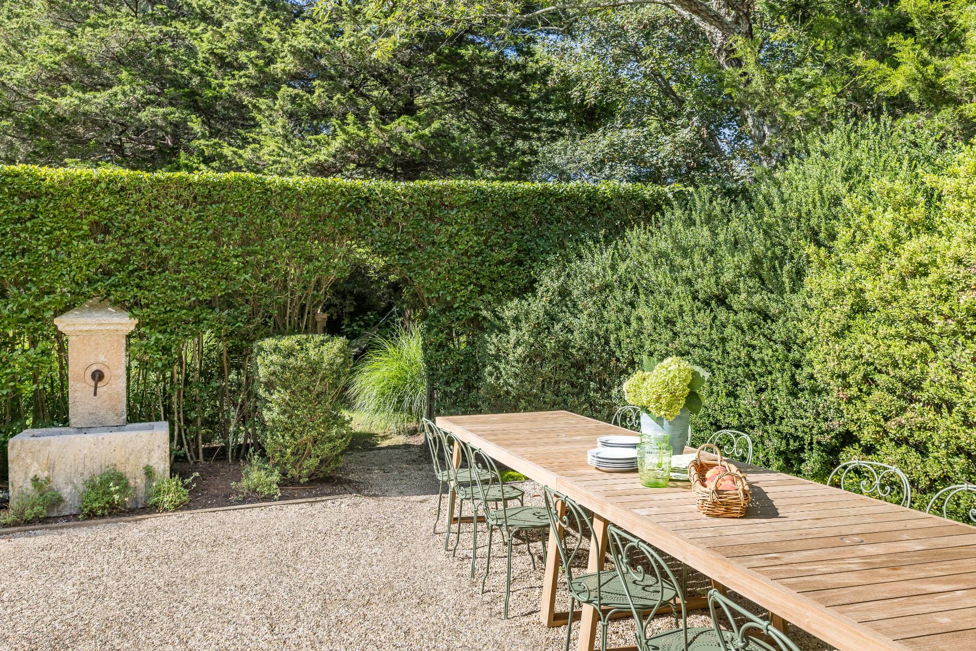 267 Meadows West Bridgehampton, NY 11932 - Photo 24 of 27 a terrace with outdoor seating and trees