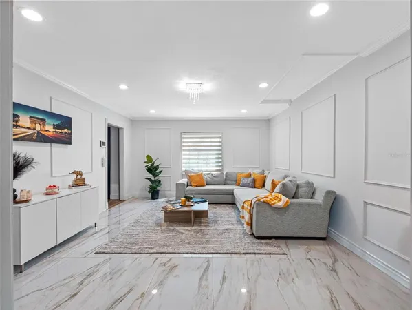 a view of a livingroom with furniture and window