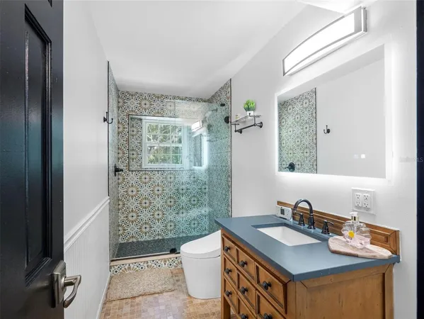 a view of a deck with wooden floor and outdoor space