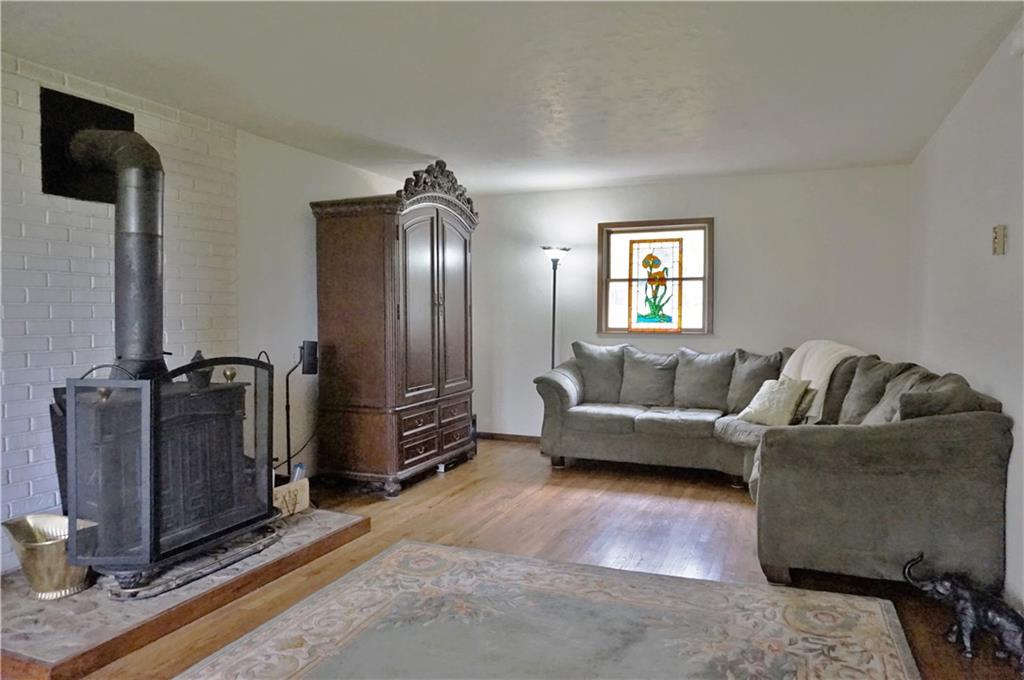 4076 Glasgow Road Valencia, PA 16059 - Photo 9 of 20 Living room with wood burner as a supplemental heat!