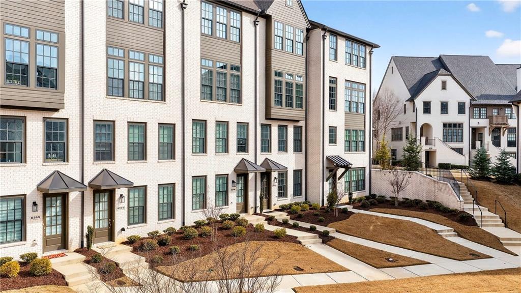 a view of a building with a lot of windows and wardrobe