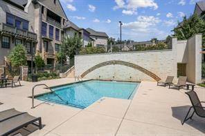 6786 Encore Boulevard Atlanta, GA 30328 - Photo 25 of 31 a view of a swimming pool with a patio