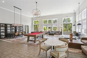 6786 Encore Boulevard Atlanta, GA 30328 - Photo 27 of 31 a dining room with furniture a chandelier and window