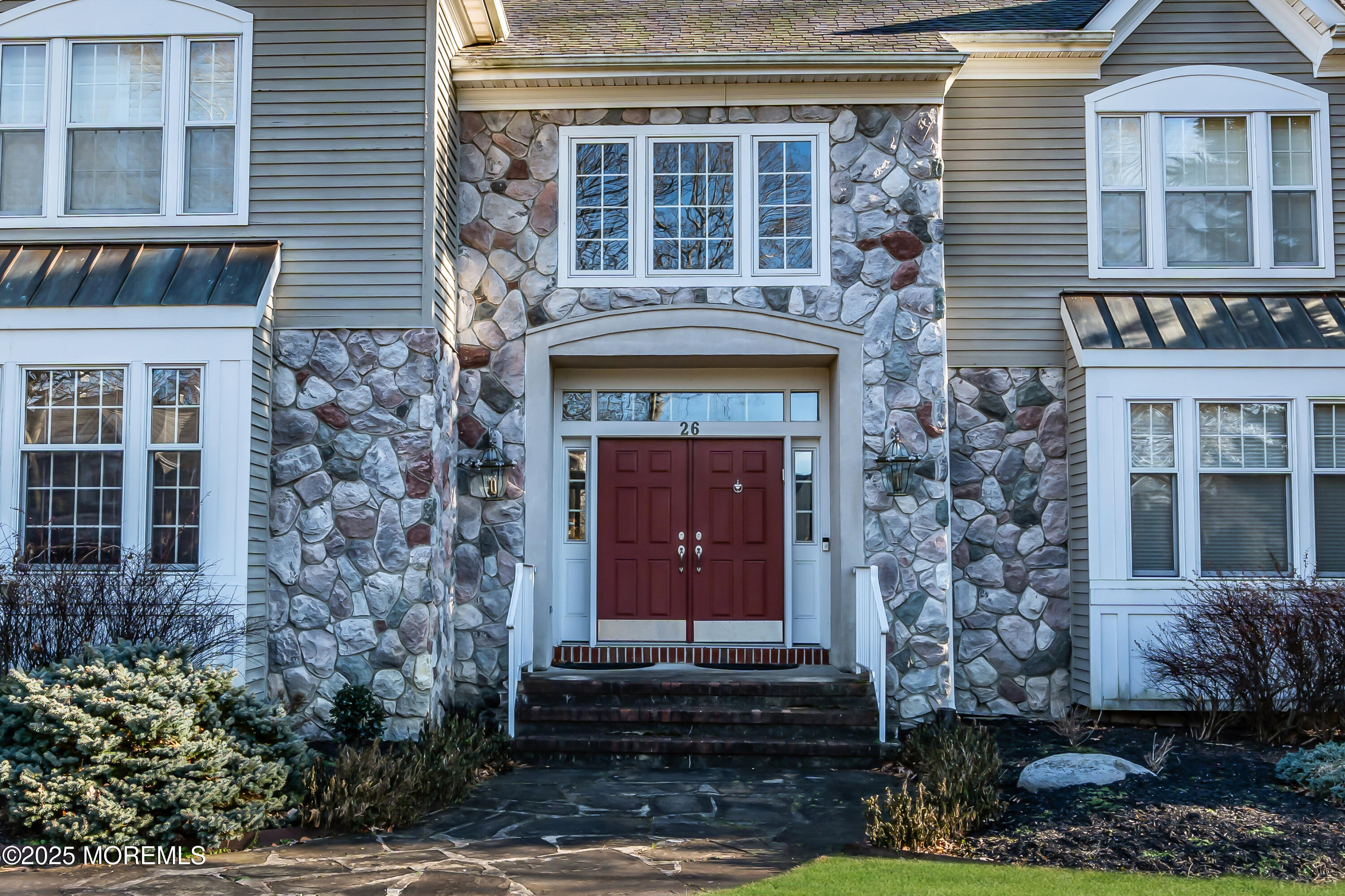 26 Bruns Road Allenhurst, NJ 07711 - Photo 12 of 82 a front view of a house with plants