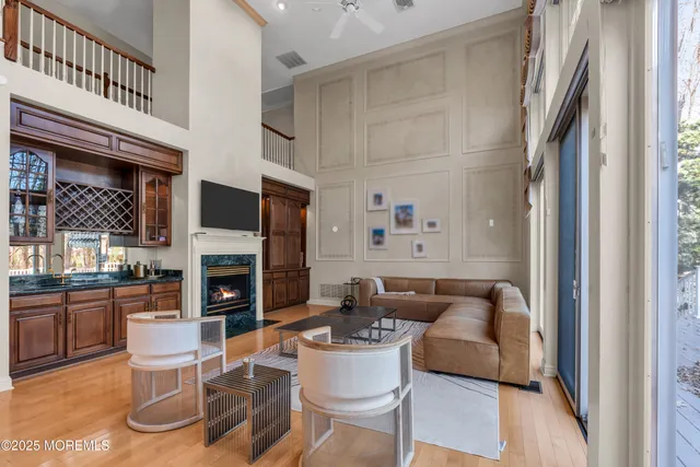 a kitchen with refrigerator and cabinets