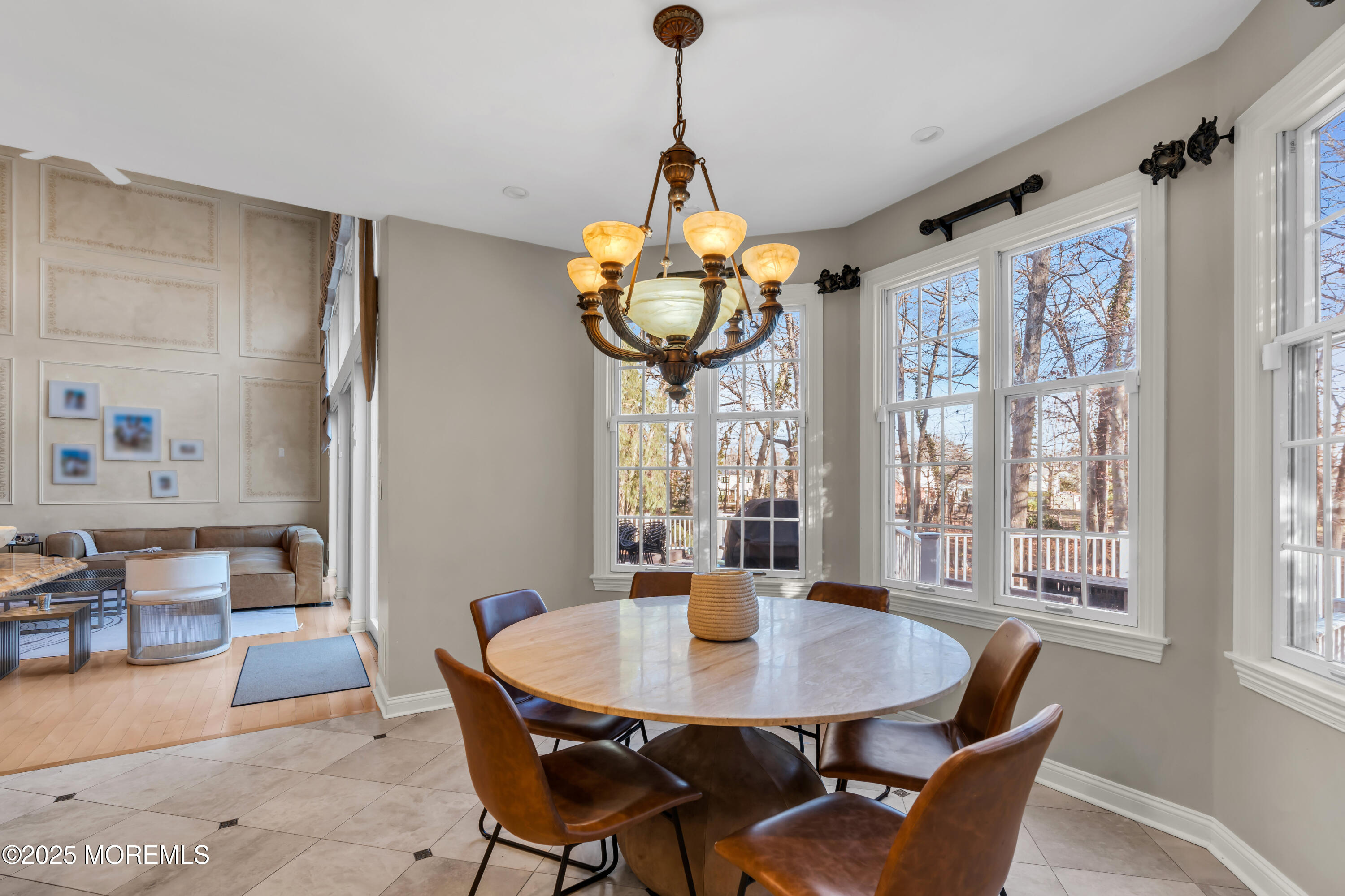 26 Bruns Road Allenhurst, NJ 07711 - Photo 18 of 82 a dining room with furniture a chandelier and wooden floor