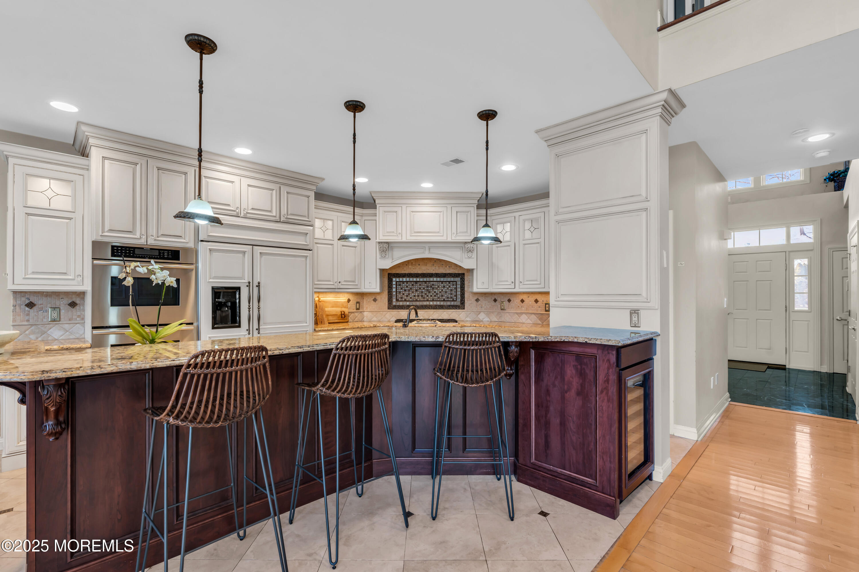 26 Bruns Road Allenhurst, NJ 07711 - Photo 24 of 82 a kitchen with stainless steel appliances granite countertop a sink a stove and a wooden floors