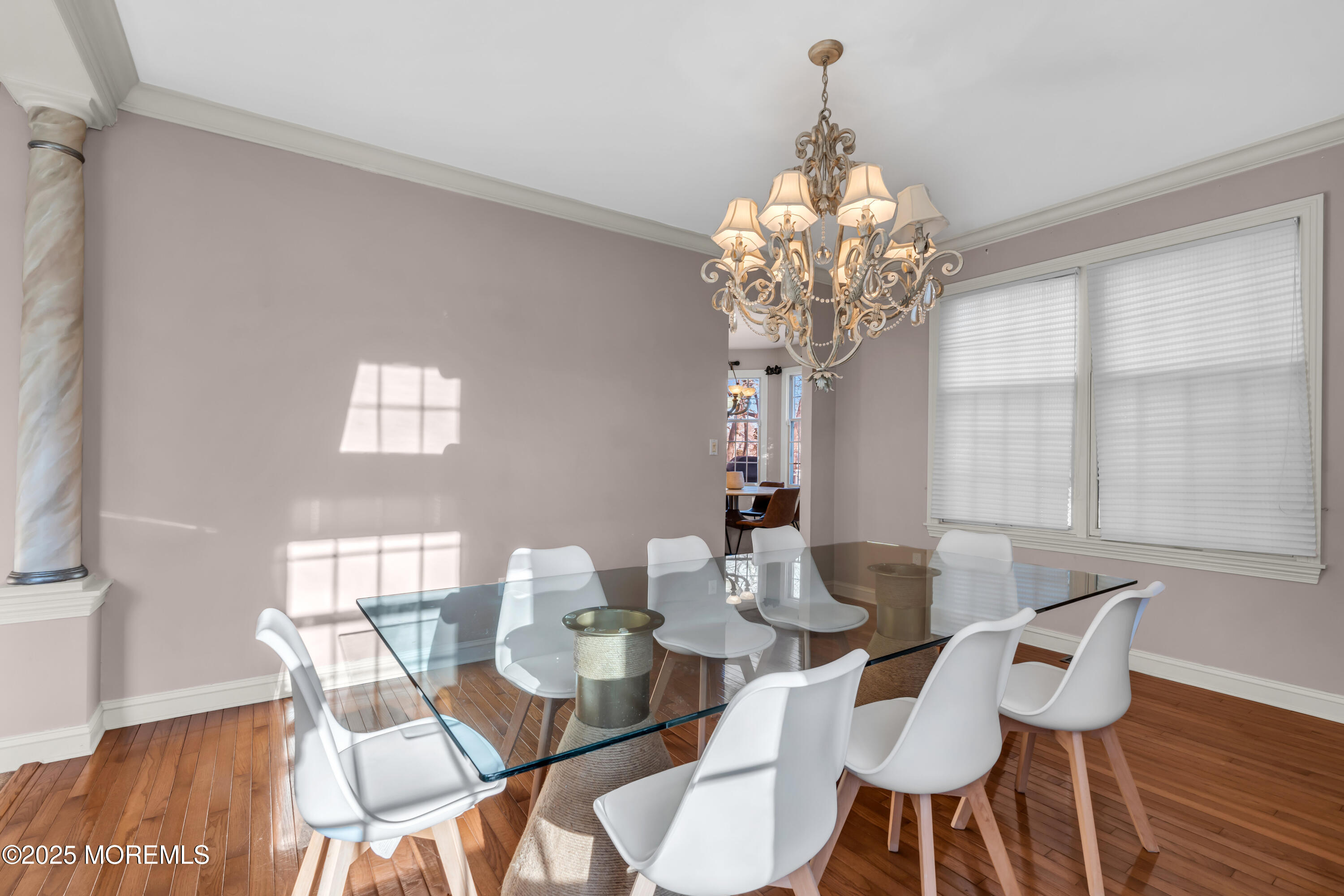 26 Bruns Road Allenhurst, NJ 07711 - Photo 28 of 82 a view of a dining room with furniture wooden floor and chandelier
