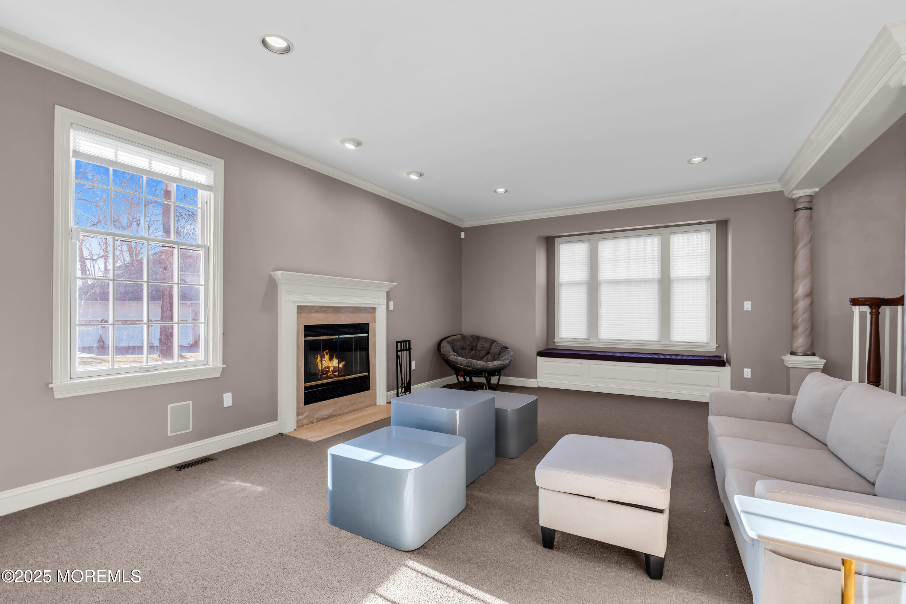 26 Bruns Road Allenhurst, NJ 07711 - Photo 30 of 82 a living room with furniture and a fireplace