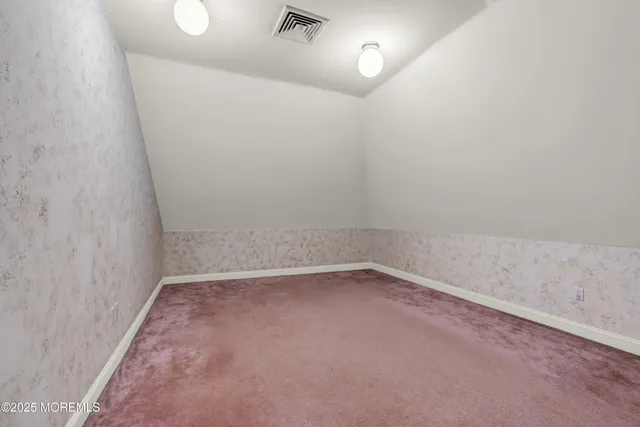 a view of a park with large trees