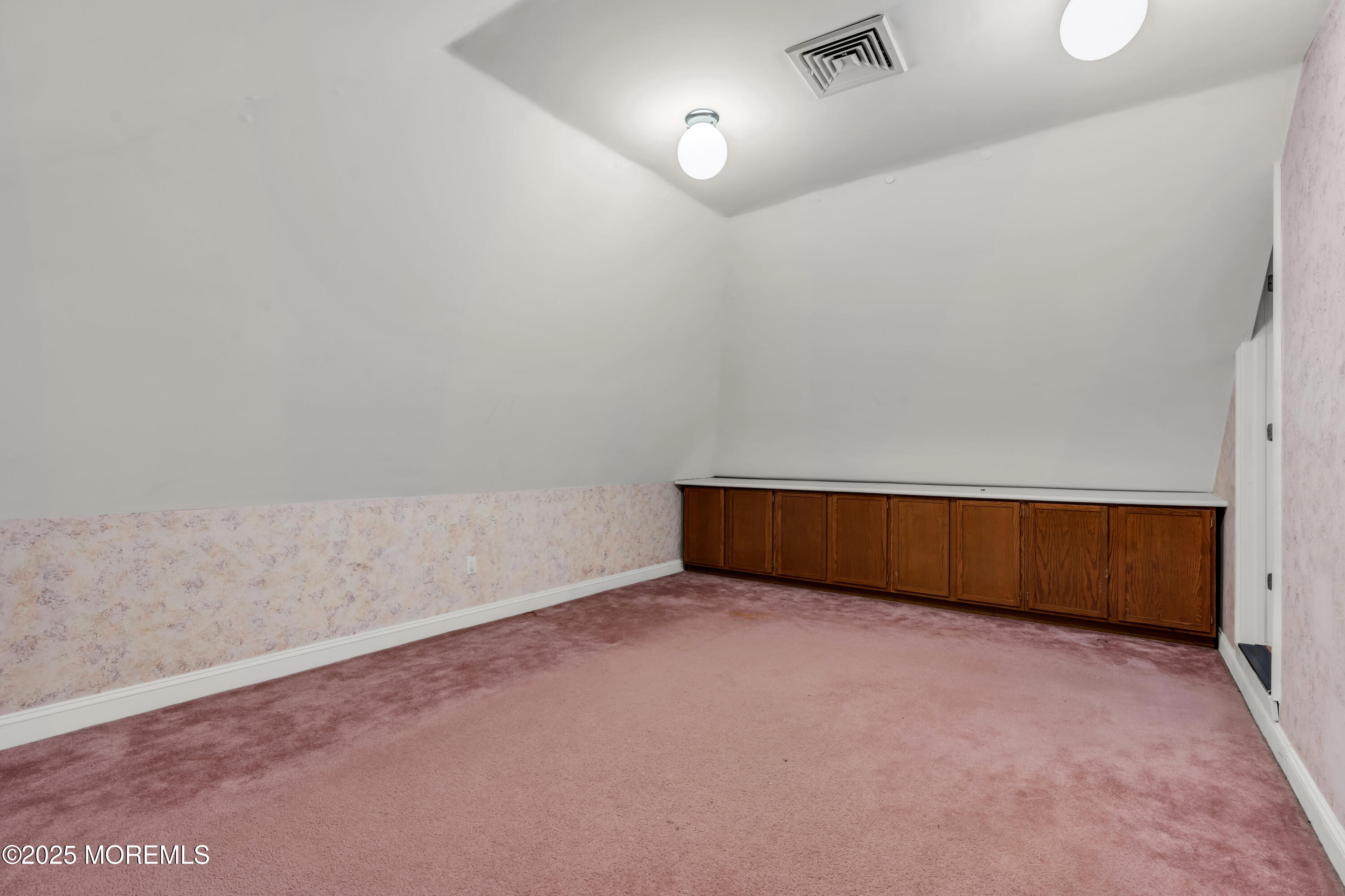 26 Bruns Road Allenhurst, NJ 07711 - Photo 52 of 82 a view of an empty room with a window