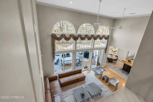 a front view of house with a garden